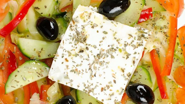 Fresh salad with feta cheese and olives