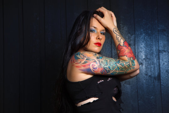 lovely woman with tattoo,.,.