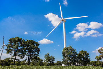 Wind Turbine for alternative energy on background sky