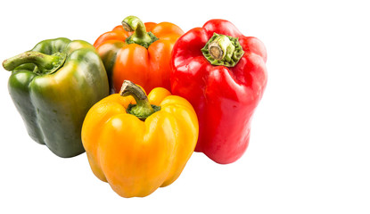 A group of different colors of capsicum over white background