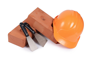Building brick with a helmet
