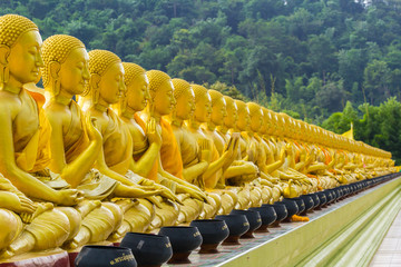 golden statue of buddhist saint