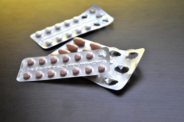 Packages of drugs on table closeup