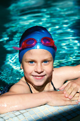 Girl learning to swim