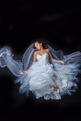 Naklejka premium Bride sitting under rain