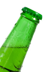 Green beer bottle with water drops on it's surface