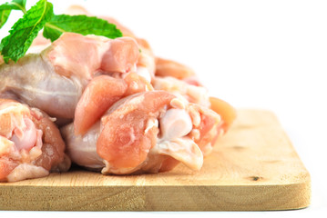 Chicken wing meat on chop board