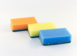 Three sponges for washing dishes on white background horizontal