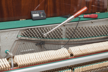 Detailed view of Upright Piano during a tuning
