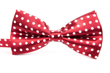 Elegant red bow tie with white polka dots