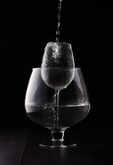 Squirt of water in the wine glass