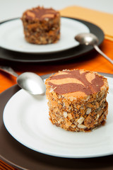 Cocoa cream desert with almond flakes plating