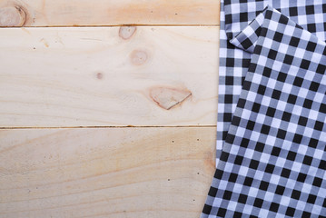 the background made from tablecloth on wooden table