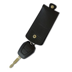 Black car Key and Keychain on white background