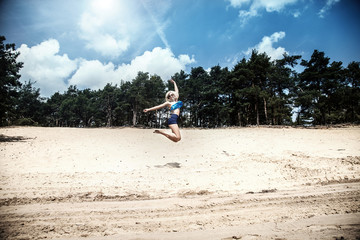 Happy blonde girl on vacation