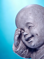 Fototapeta premium Śmiejący się kamienny budda