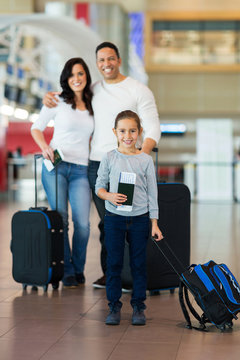 little girl travelling with her parents