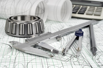 roller bearing, vernier callipers , compasses and drawings .