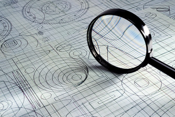 drawing and magnifying glass, selective focus