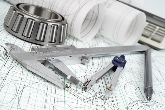 roller bearing, vernier callipers, compasses and drawings