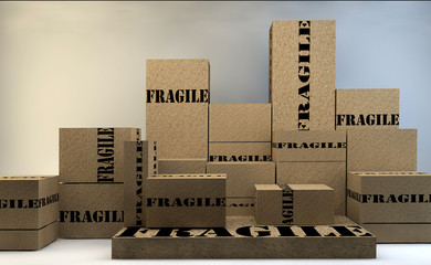 Pile of cardboard boxes with fragile sign ready to be shipped
