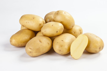 group of new nice potatoes on white background