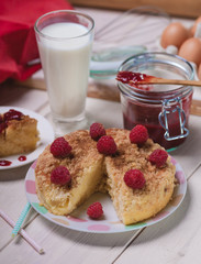 Rustic style of raspberries pie on wooden planks