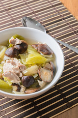 Pickled lettuce soup with shiitake mushroom and pork