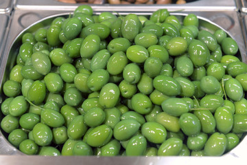 green olives in a metal container