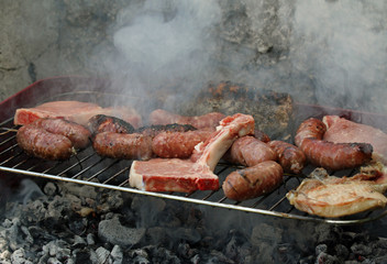 grilled meat barbecue with pork and sausages 2