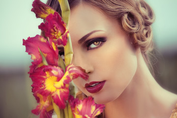 Beautiful woman in a flower field