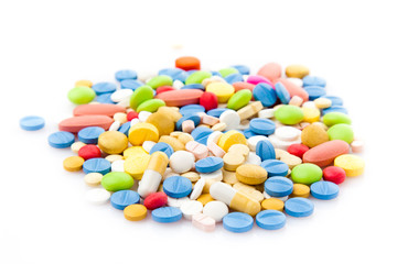 colorful pills isolated on white