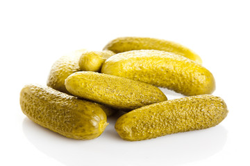 marinated pickled cucumbers isolated on white.