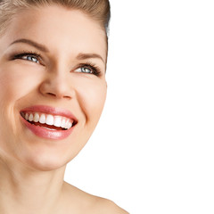Portrait of pretty smiling woman with perfect white teeth.