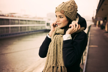 Attractive young woman in wintertime outdoor