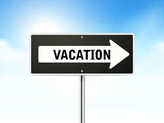 vacation on black road sign