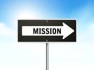 mission on black road sign