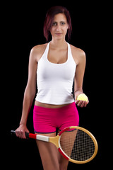 Beautiful young girl with a tennis racquet 