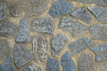 Granite Rocks Laid On Surface Of Pavement