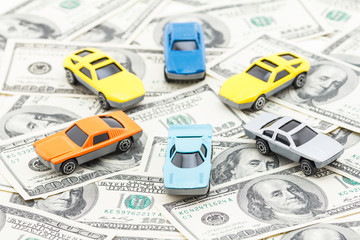Purchase and sale of cars by money.
