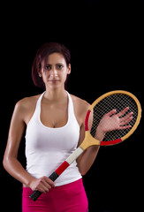 Beautiful young girl with a tennis racquet 