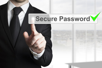 businessman pushing touchscreen secure password checked green