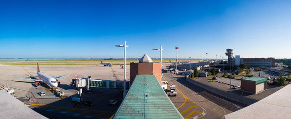 Planes parked at the passenger terminal of Marco Polo Airport