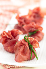 Italian food. Stuffed bresaola appetizers for holidays.