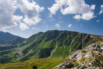 Amazing summer mountains ridge - blue sky and clouds