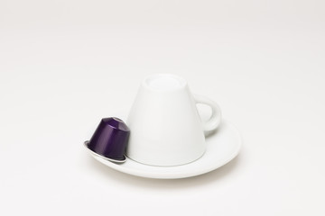 Coffee cup with capsule