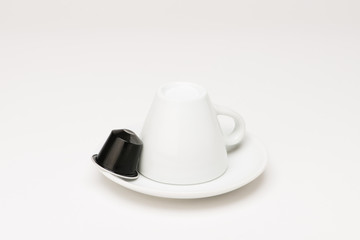 Coffee cup with capsule