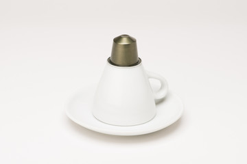 Obraz na płótnie Canvas Coffee cup with capsule