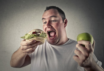 man eating junk food