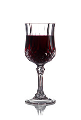 Red wine in a wineglass on a white background
